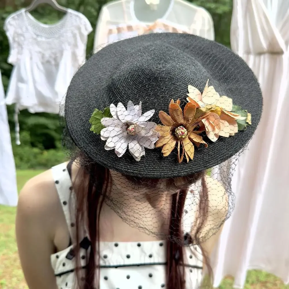 40s black straw cartwheel tilt hat w/ lavender & orange fabric daisies & veil